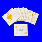 Small 12-page paper booklet (zine) with a print of a water bearer, Aquarius on display, 4.25 inch by 3.66 inch dimension. 