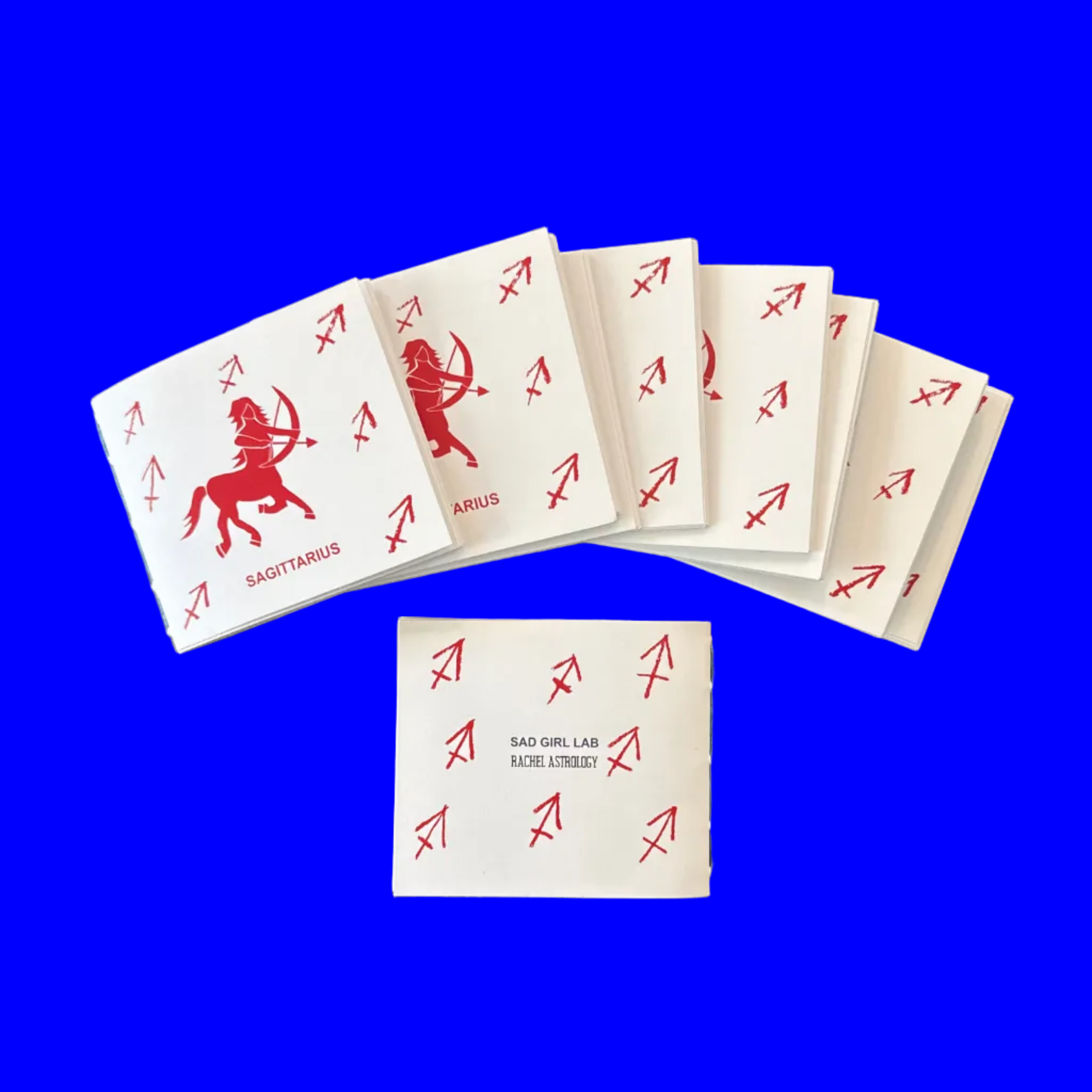 Small 12-page paper booklet (zine) with a print of a centaur with an arrow, Sagittarius on display, 4.25 inch by 3.66 inch dimension. 